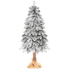 Umetno zasneženo drevo smreka na deblu